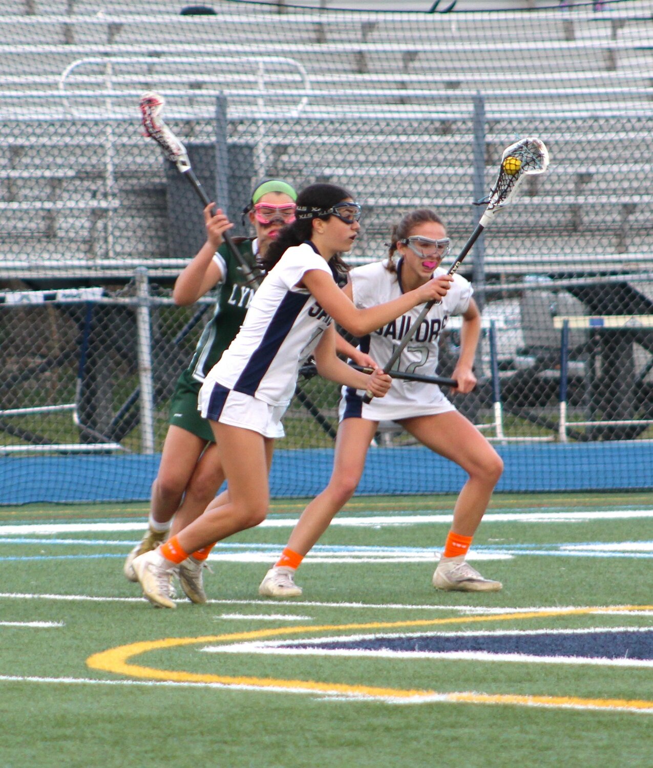 Ella Salonia scored three of the Oceanside junior varsity lacrosse team’s eight goals on May 4, helping the Sailors beat Lynbrook. The game was dedicated to Ella’s older sister, Ava, a team member who is battling a rare form of leukemia.