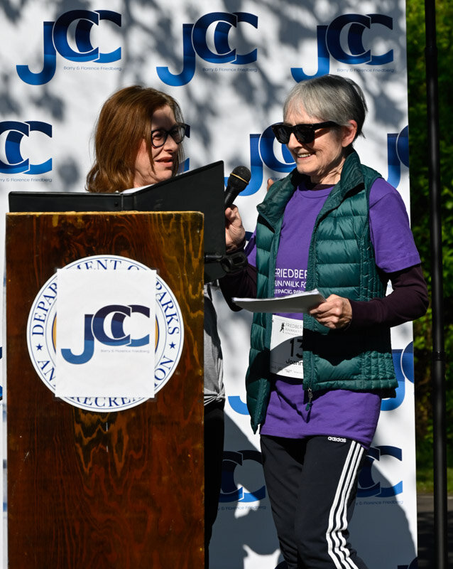 Gloria Lebeaux, director of social services at Friedberg JCC, left, with Joanne Moore, who takes part in many of the Parkinson’s Disease programs offered at the JCC.