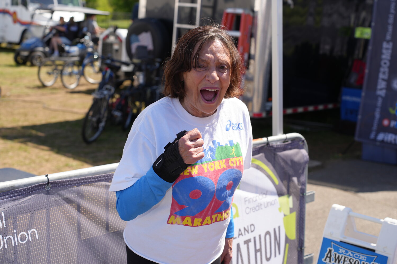 Nina Kuscsik, a retired long-distance runner and Long Island native show her support for runners at the Jovia Long Island Marathon. The 84-year-old was the first woman to officially win the Boston Marathon back in 1972, and has run in more than 80 marathons in her lifetime.