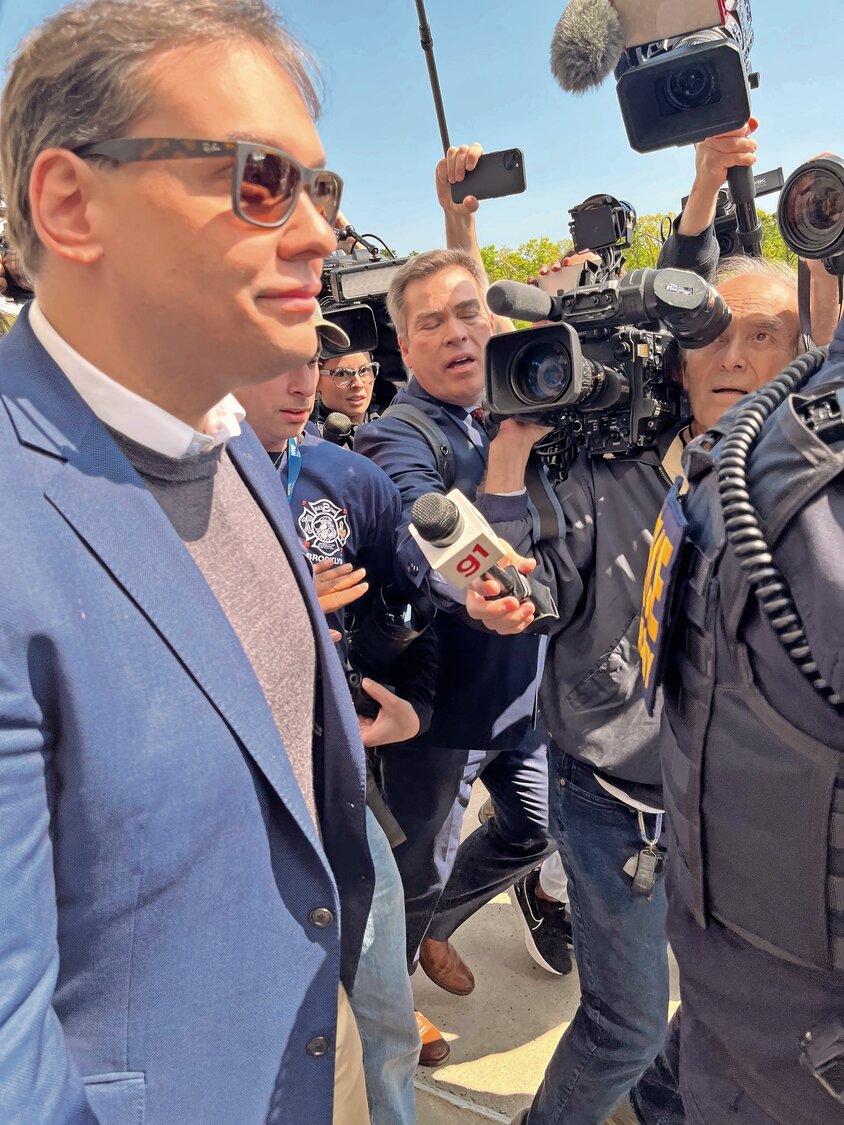 U.S. Rep. George Santos briefly addressed reporters after appearing in court, telling them he will still serve in Congress, and will even seek re-election.