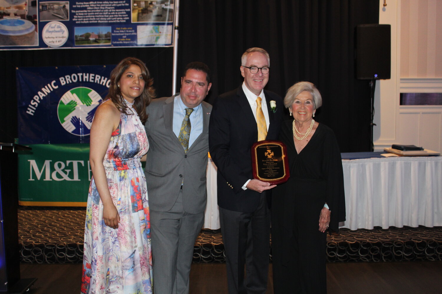 Hispanic Brotherhood president Vanessa Wagner with Vice President Alex Cepero; one of the awardees, Town of Hempstead Supervisor Don Clavin; and Brotherhood executive director Margarita Grasing. Clavin and Grasing worked closely together during the pandemic to get food and supplies to town residents.