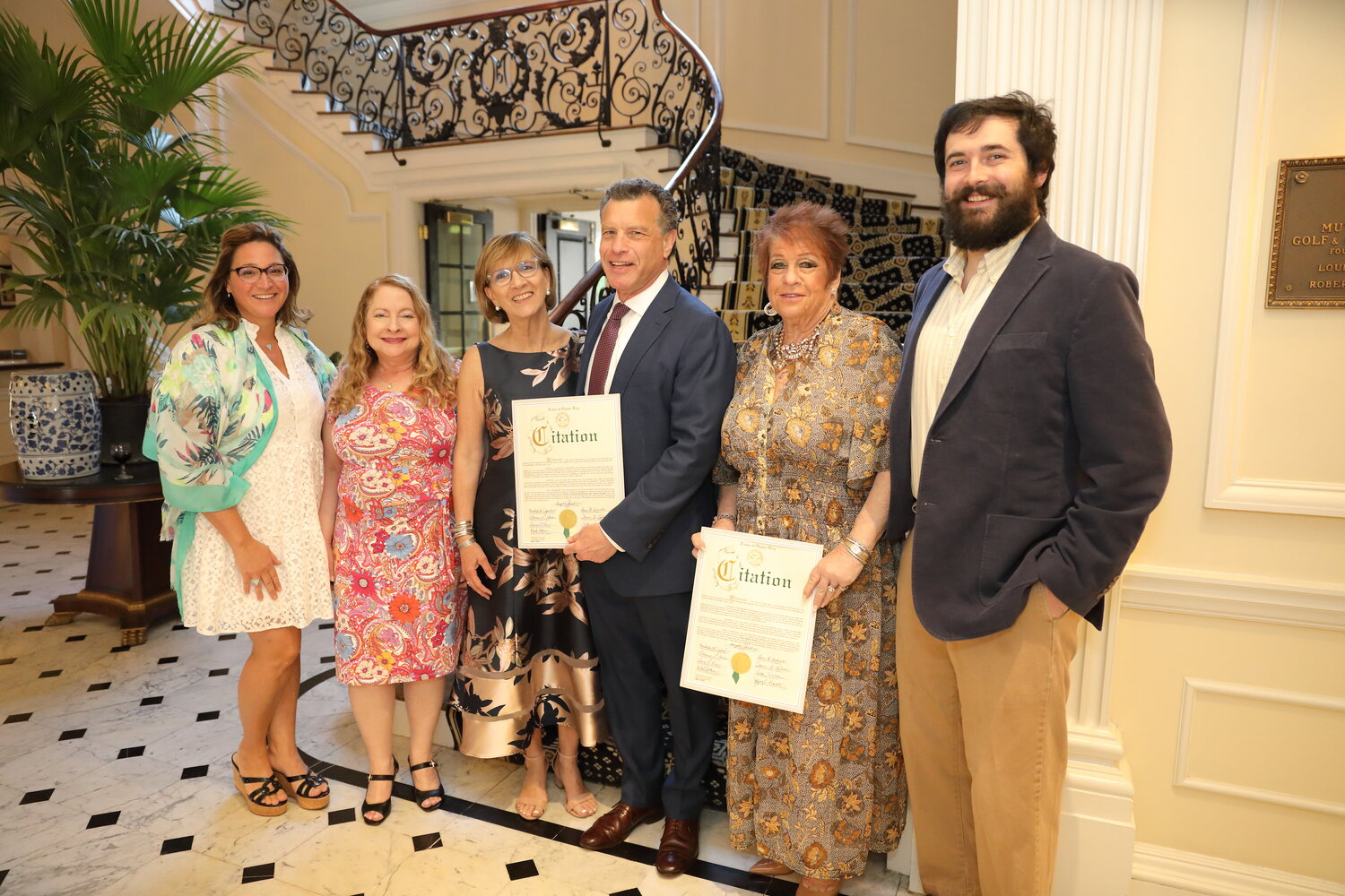 Michele Johnson, Town of Oyster Bay councilwoman far left, honored Laura Lane, Herald senior editor, Nancy and Stuart Richner, Herald publisher, Iris Picone, operations manager, Anton Community Newspapers, and Will Sheeline, reporter for the Herald, for their efforts in community journalism at Raynham Hall’s annual Love Re-Awakened Benefit.