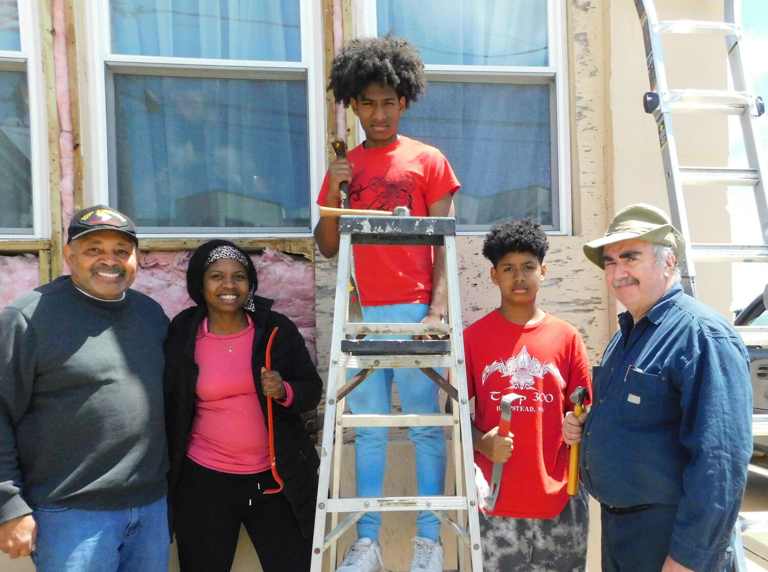 William Clinton Story American Legion Post 342 Commander Coy Richardson, left, Renaye Soto and her sons Jeremiah (Eagle Scout candidate) and Joshua Soto of BSA Troop 300, and BSA troop mentor Charlie Hart are refacing the Post 342 headquarters.