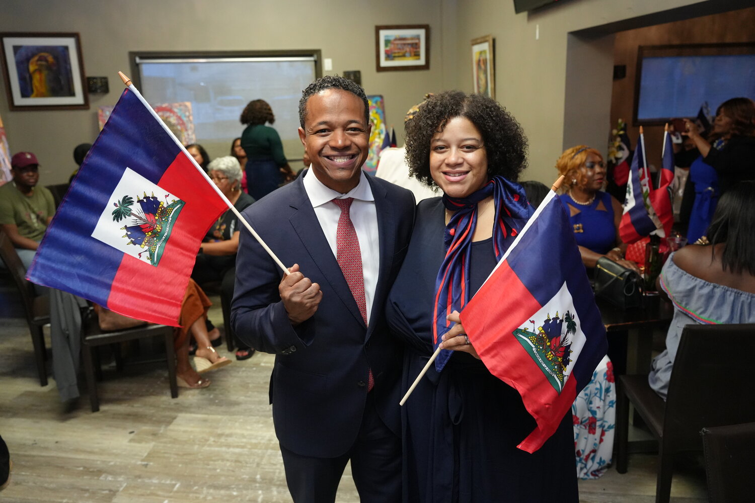 Legislator Carrié Solages, left, and Assemblywoman Michaelle Solages showed off their Haitian pride during the annual Haitian Heritage Month Celebration in Valley Stream, which the siblings organized together.