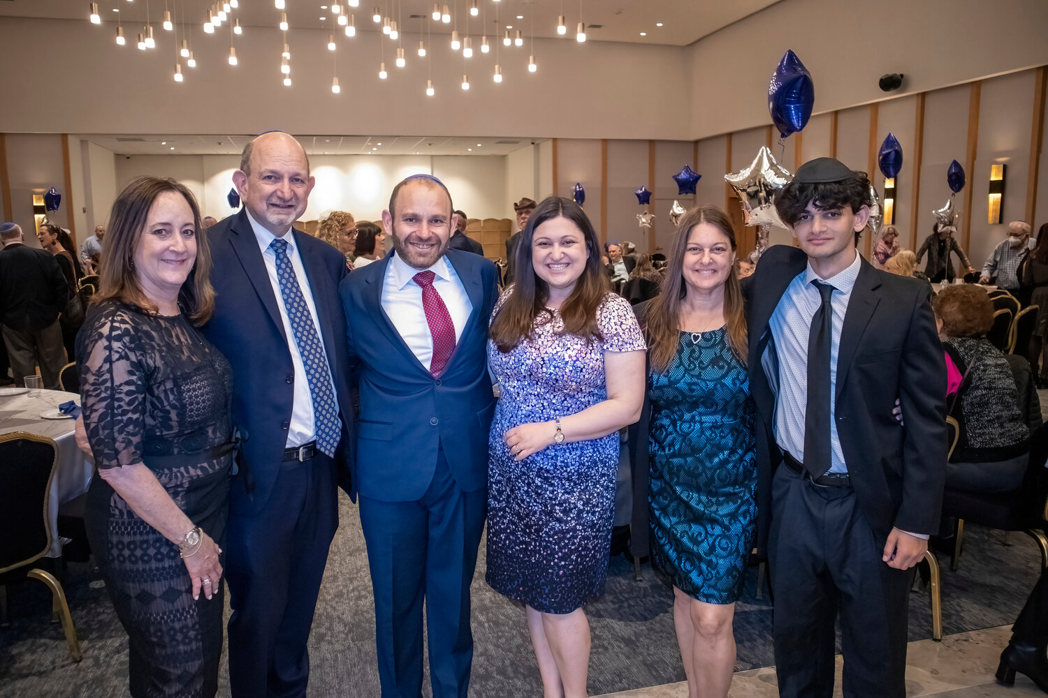 Senior Rabbi Joshua Dorsch, center, was officially installed at the Merrick Jewish Centre on Saturday. He was joined by members of his family, including from left, Deborah-Jo Essrog, Jay Dorsch, his wife, Stef Dorsch , Sandi Millman, Asher Millman.