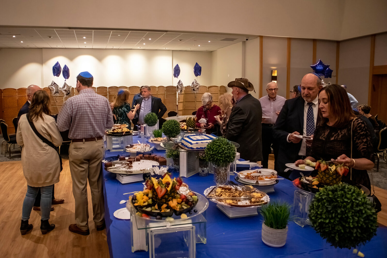 A casual desert reception followed the ceremony in the Merrick Jewish Centre’s social hall.
