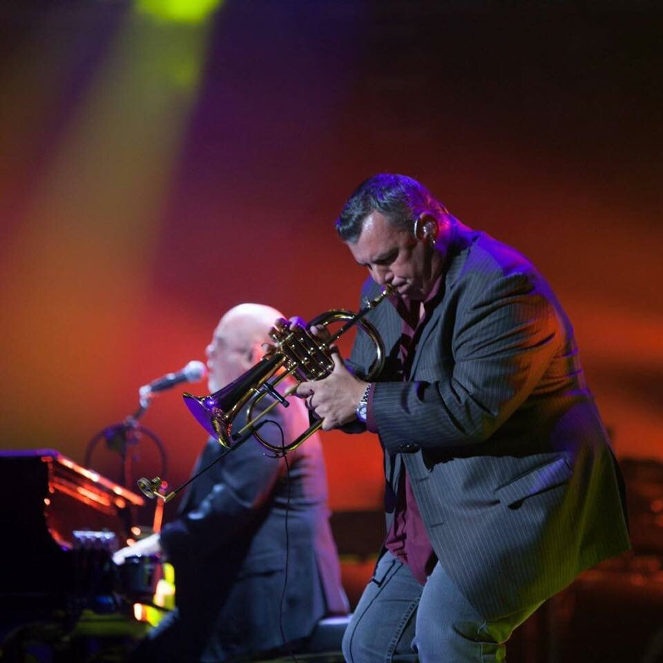 Fischer usually performs with Billy Joel, as well as four other bands.