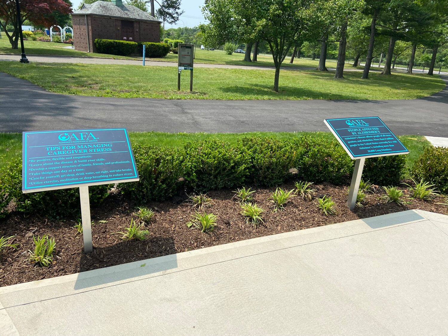 Each plaque at the respite park offers information for caregivers.