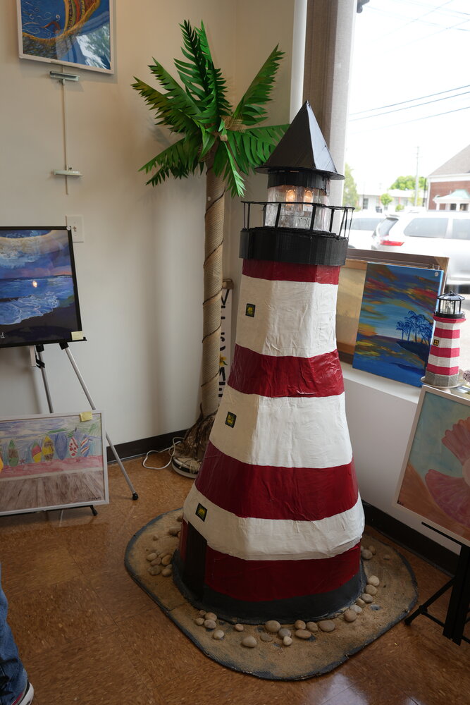 The lighthouse took nearly three months to make, and it features a working, rotating light on top.