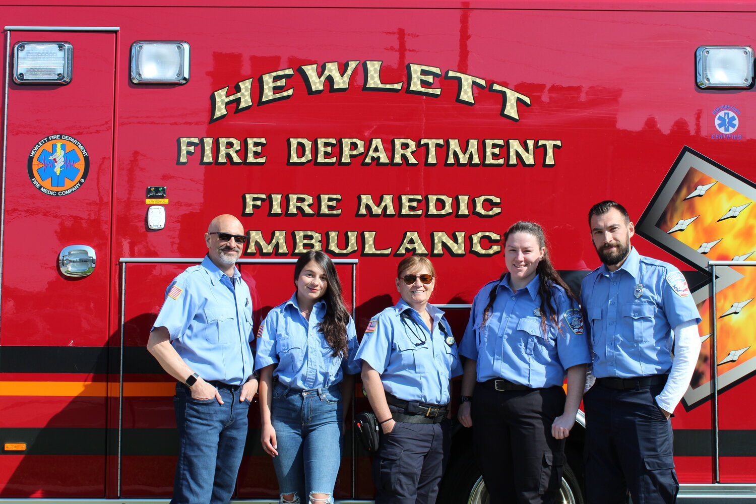 The volunteer Hewlett Fire Department has covered parts of Hewlett, North Woodmere, and its surrounding areas since 1891. Posed in front of its ambulance truck from left are Martin Kohn, secretary Daniela Barskaya, Capt. Karen Fiorello, Samantha Beauchamp and Lt. Gary Kotlyar.