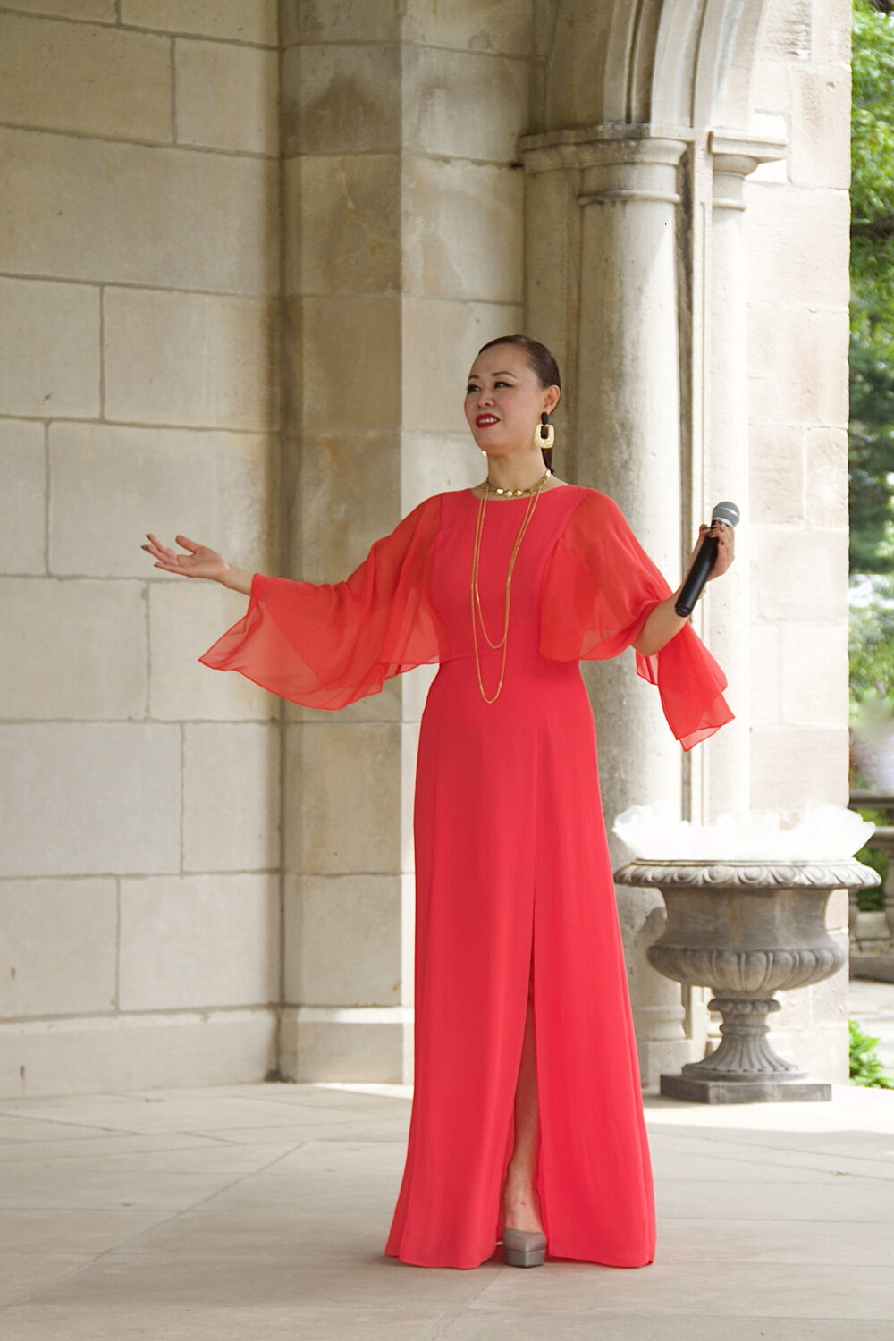 Soprano Jojo Feng, serenaded the crowd at the historic Planting Fields Arboretum.