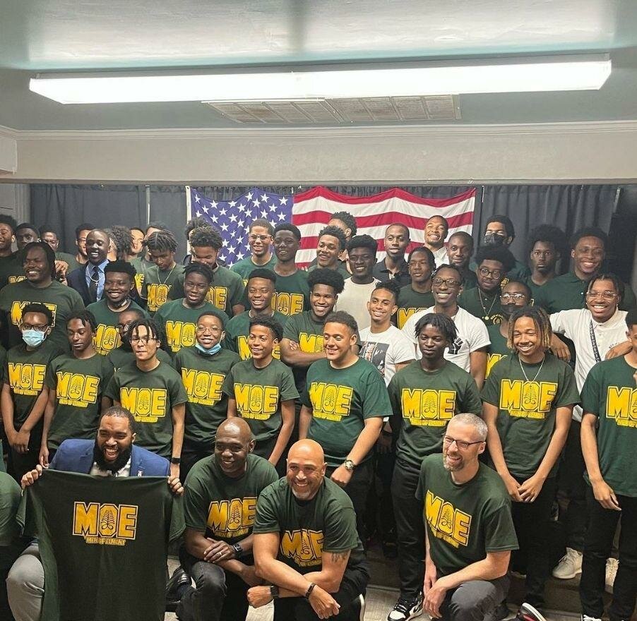 Elmont High Principal Kevin Dougherty, bottom right, established the Men of Elmont program in 2016 with the goal of teaching core leadership values and preparing young men for their futures after school.
