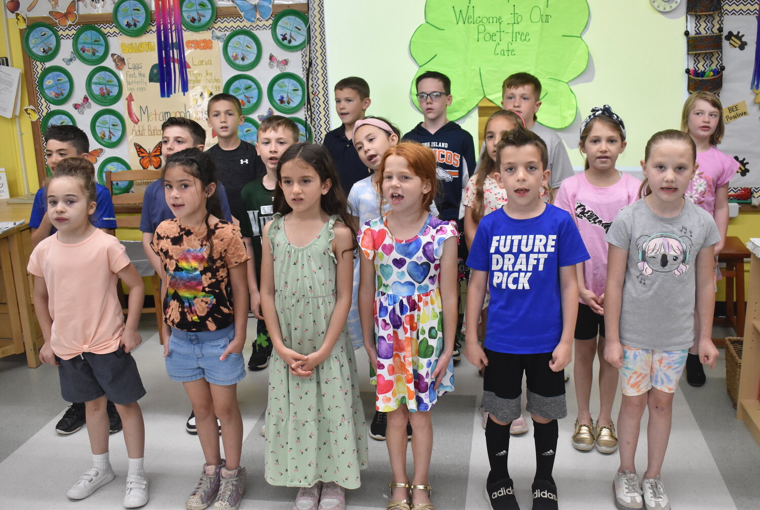 Second graders in AnneMarie Motisi’s class at Seaford Manor Elementary School opened the Poetry Café on May 16 with a group performance.
