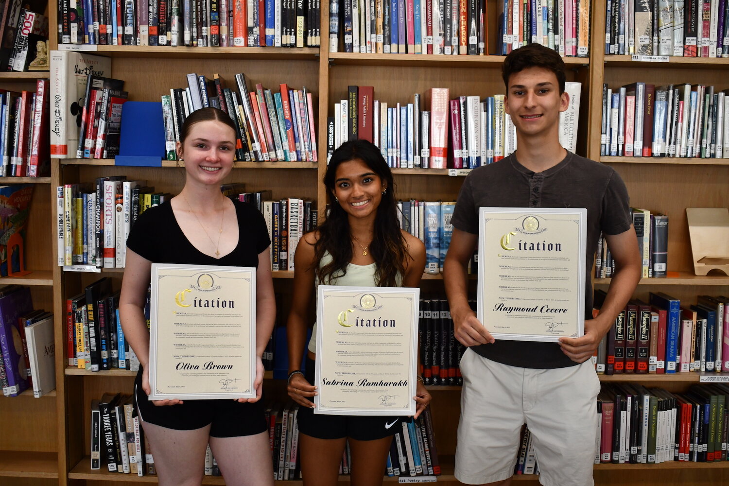 Malverne High School students Olivia Brown, Sabrina Ramharakh, and Raymond Cecere were recognized as Young Leaders in the 21st Century by Assemblyman Brian Curran.