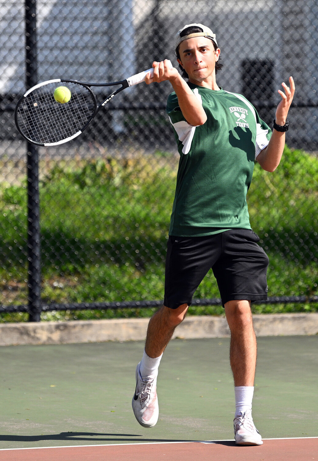 Senior Nicholas Papazis held down the top singles spot for the Cougars, who earned their first conference title in five years.