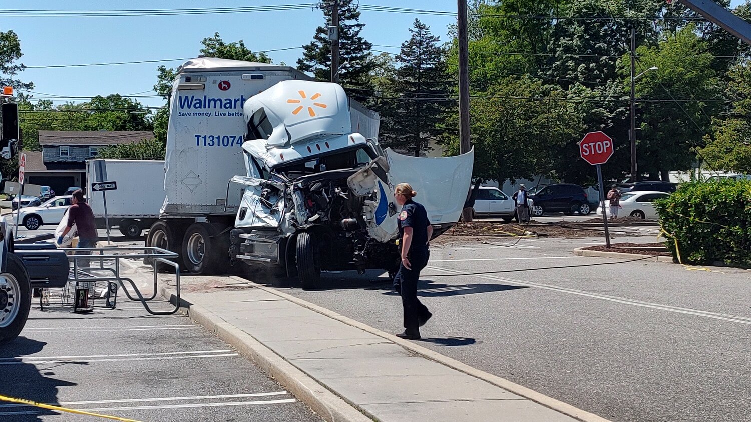 A multi-vehicle crash, which began in East Meadow and ended in Bellmore, caused several injuries and led to one arrest. A tractor-trailer overturned in the parking lot of the North Bellmore Stop & Shop, after striking several cars, police say.
