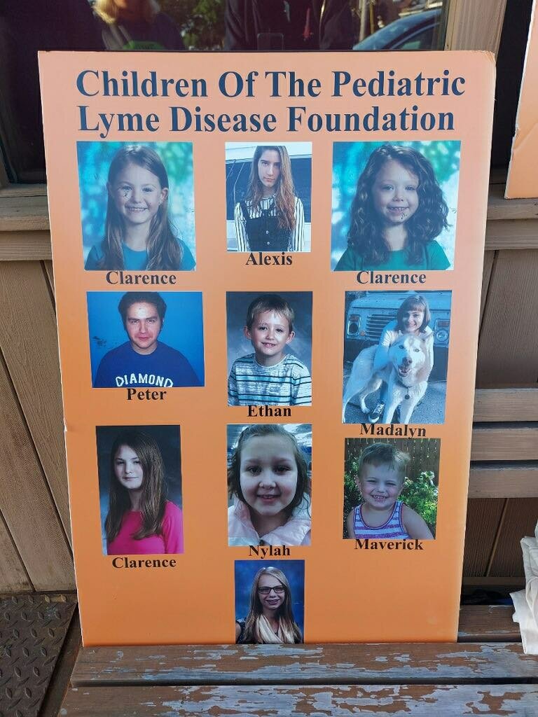 A poster at the Take a Bite Out of Lyme event shows the faces and names of the children at the Pediatric Lyme Disease Foundation that the proceeds went towards helping.
