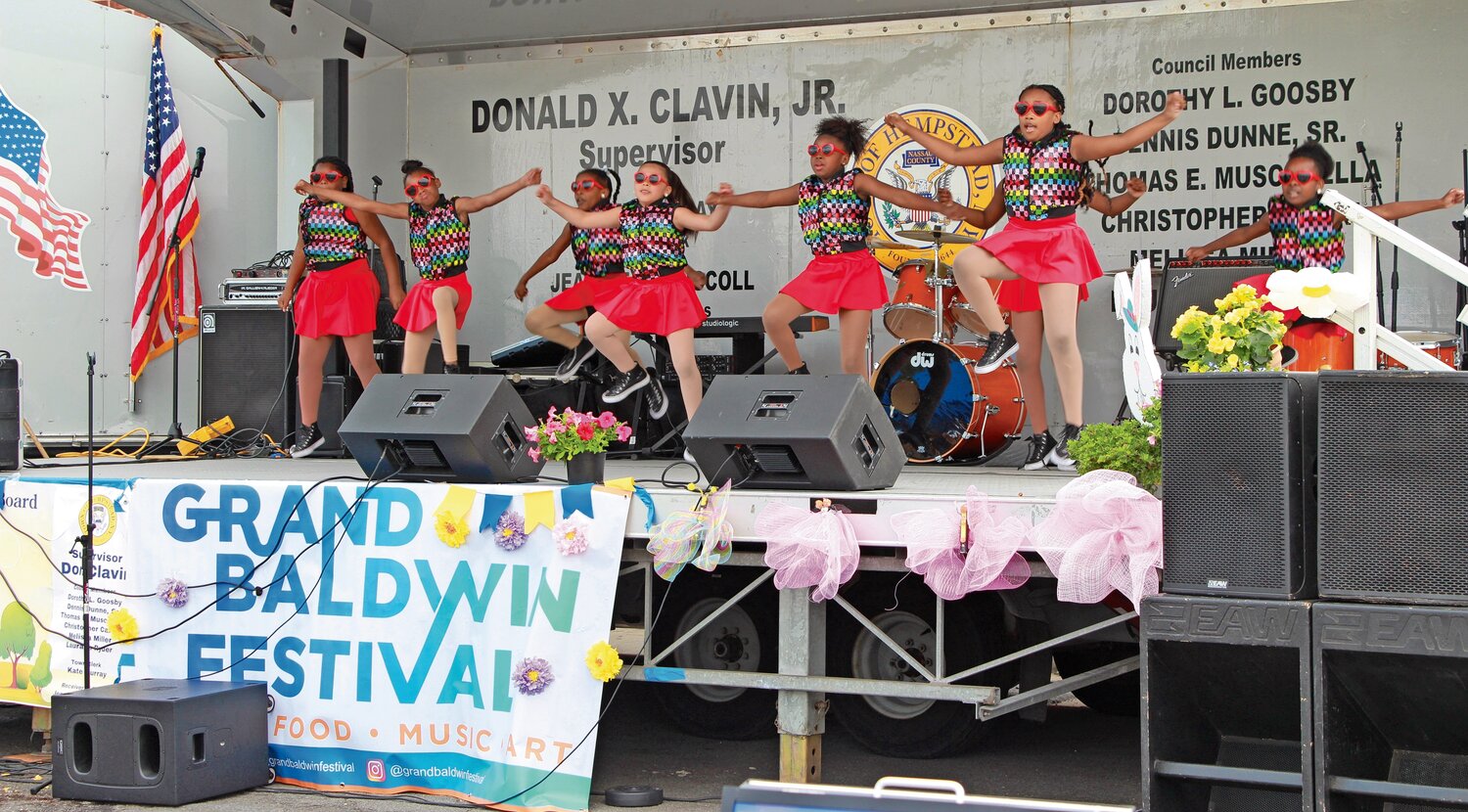Junior top dancers from the Destined to Dance Performing Arts Center performing at the Grand Baldwin Festival.