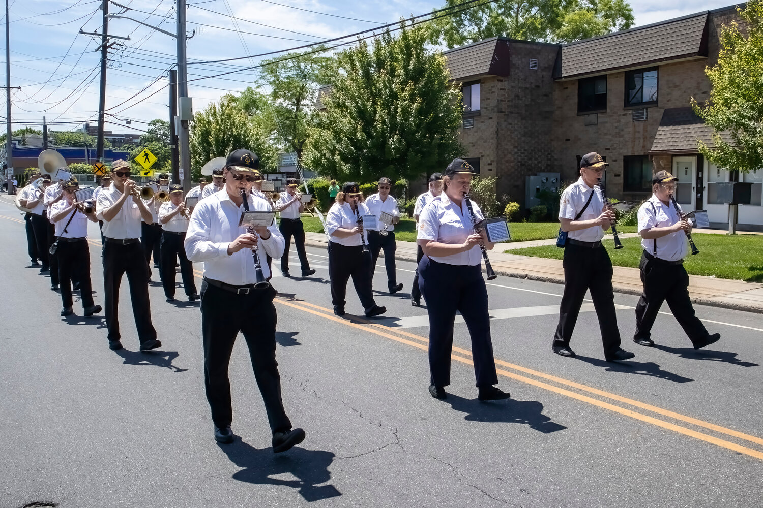 Our Lady of Good Counsel Mazza band members marched and performed during the Inwood Memorial Day Parade on May 28.