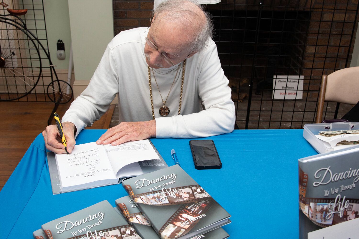 Village icon Gaetano ‘Guy’ Ferrara hosted a book signing of his autobiography, ‘Dancing My Way Through Life,’ at the Pagan-Fletcher Restoration on May 21.