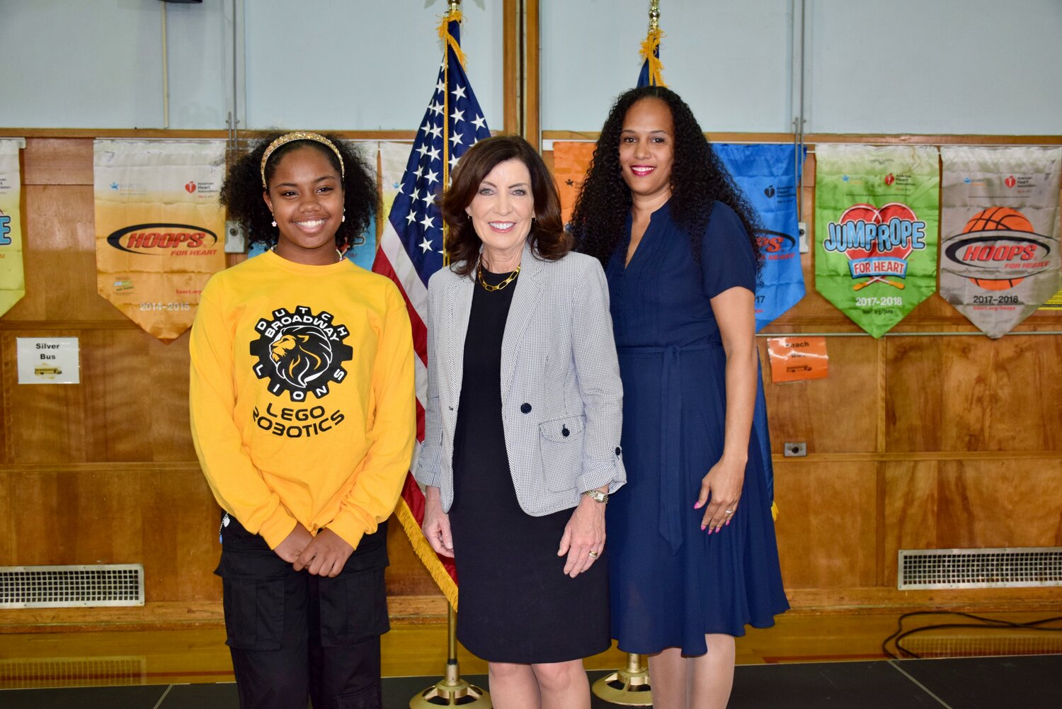 Governor Kathy Hochul, center, stopped by Dutch Broadway to hear principal Cynthia Qasim, right, about the school’s STEM programs and the resources that students like sixth grader Khloe Gajadhar, left, need to succeed.
