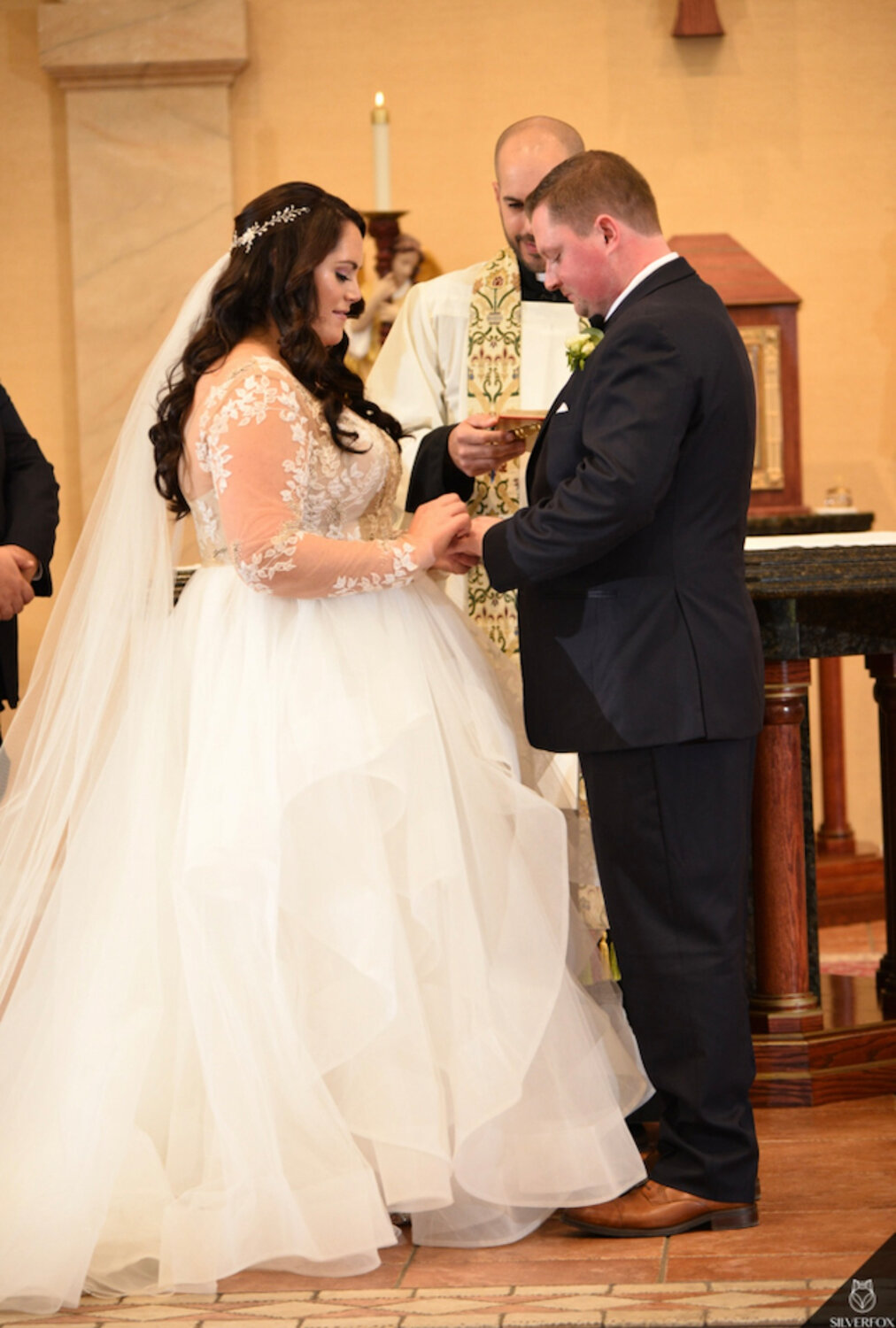 John and Danielle Garren held their dream wedding ceremony at Christ the King Church in October 2021.