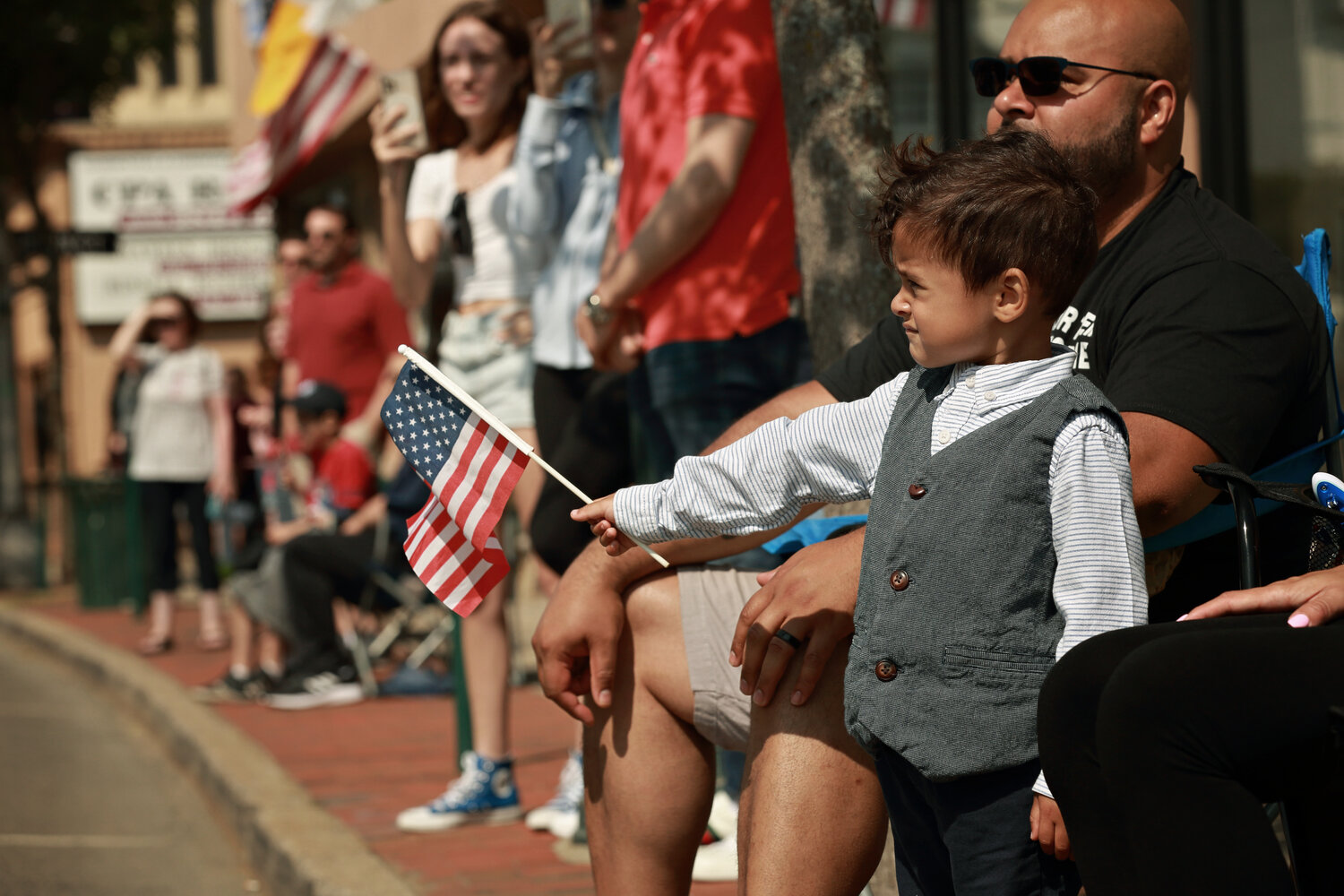 3-yearold Grayson Morales of Lynbrook honors the spirit for Memorial Day with an American flag.
