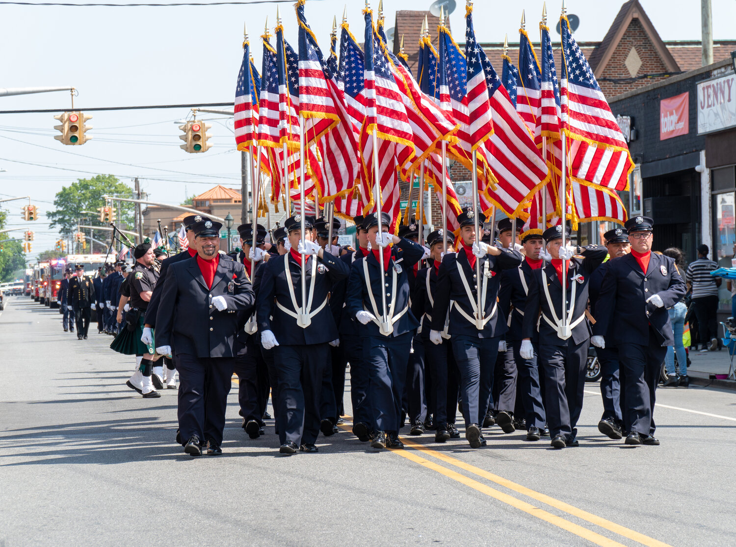 The Valley Stream Fire Department proudly shows off its colors during the Memorial Day parade on May 29.