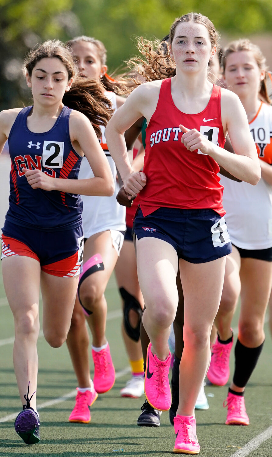 Claire Bohan, right, was a double county champion in Nassau Class AA track and field, capturing the 1500- and 3000-meter races.
