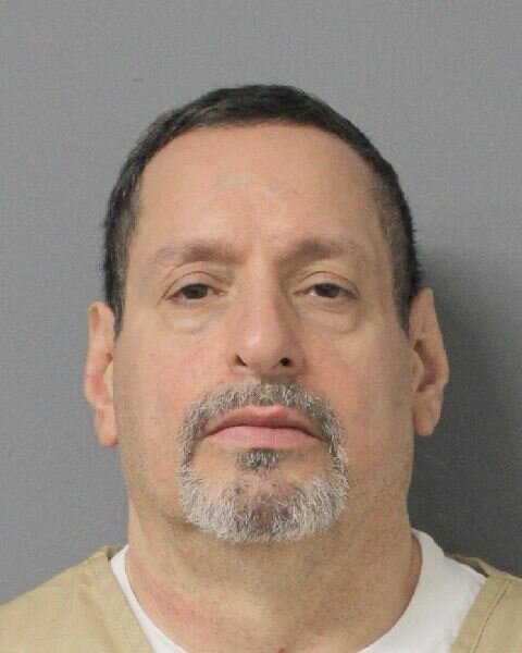 Michael Carrion, 57, was arrested in connection to a scam where he fraudulently identified himself as a fire inspector.