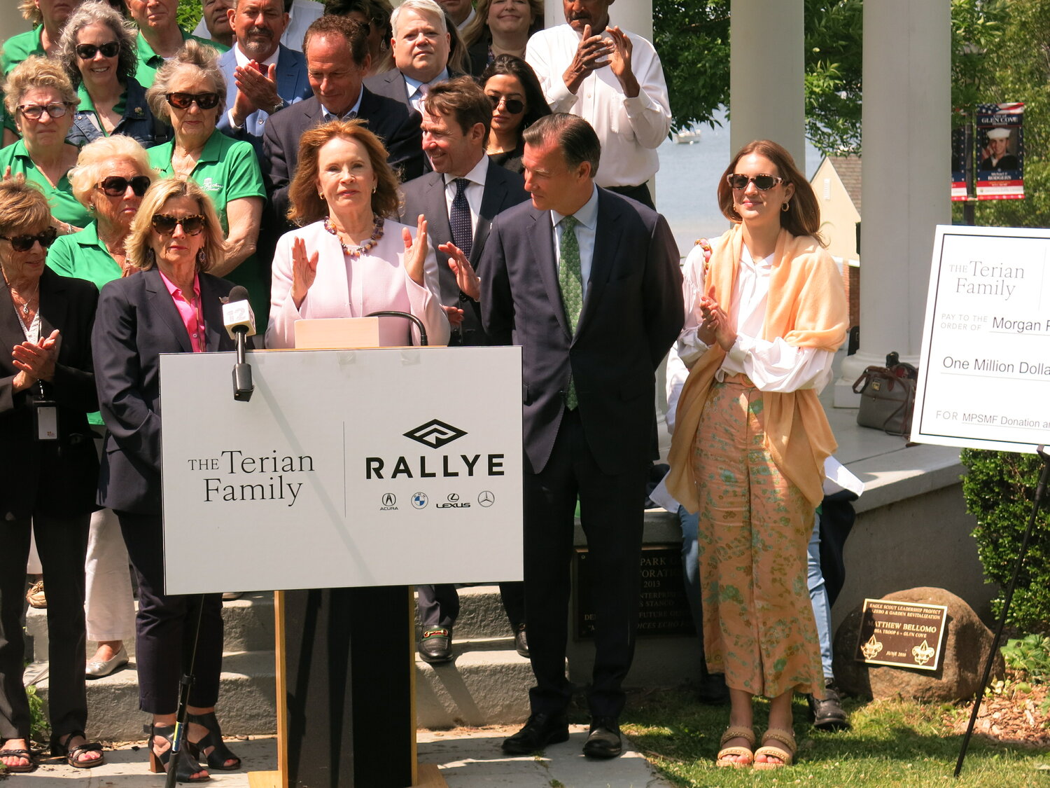 Juliana Terian, president, CEO of Rallye Motor Company, center, has given the Morgan Summer Music Festival a $1 million donation and sponsorship. Former Congressman Tom Suozzi, second from right, arranged for a news conference on to celebrate the generosity of the Terian Family and Rallye Motor Company.