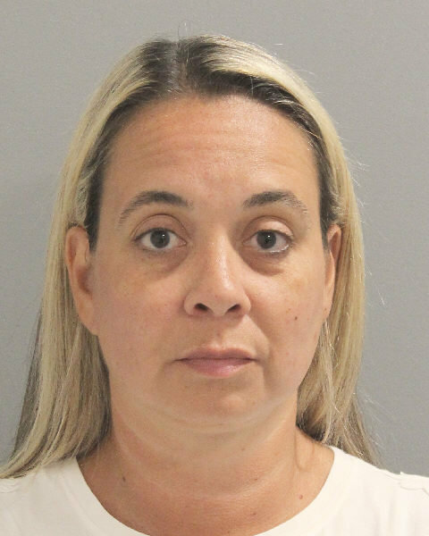 East Islip resident Iris Gomez is alleged to have stolen more than $450,00 from a Seaford church and the Diocese of Rockville Centre.