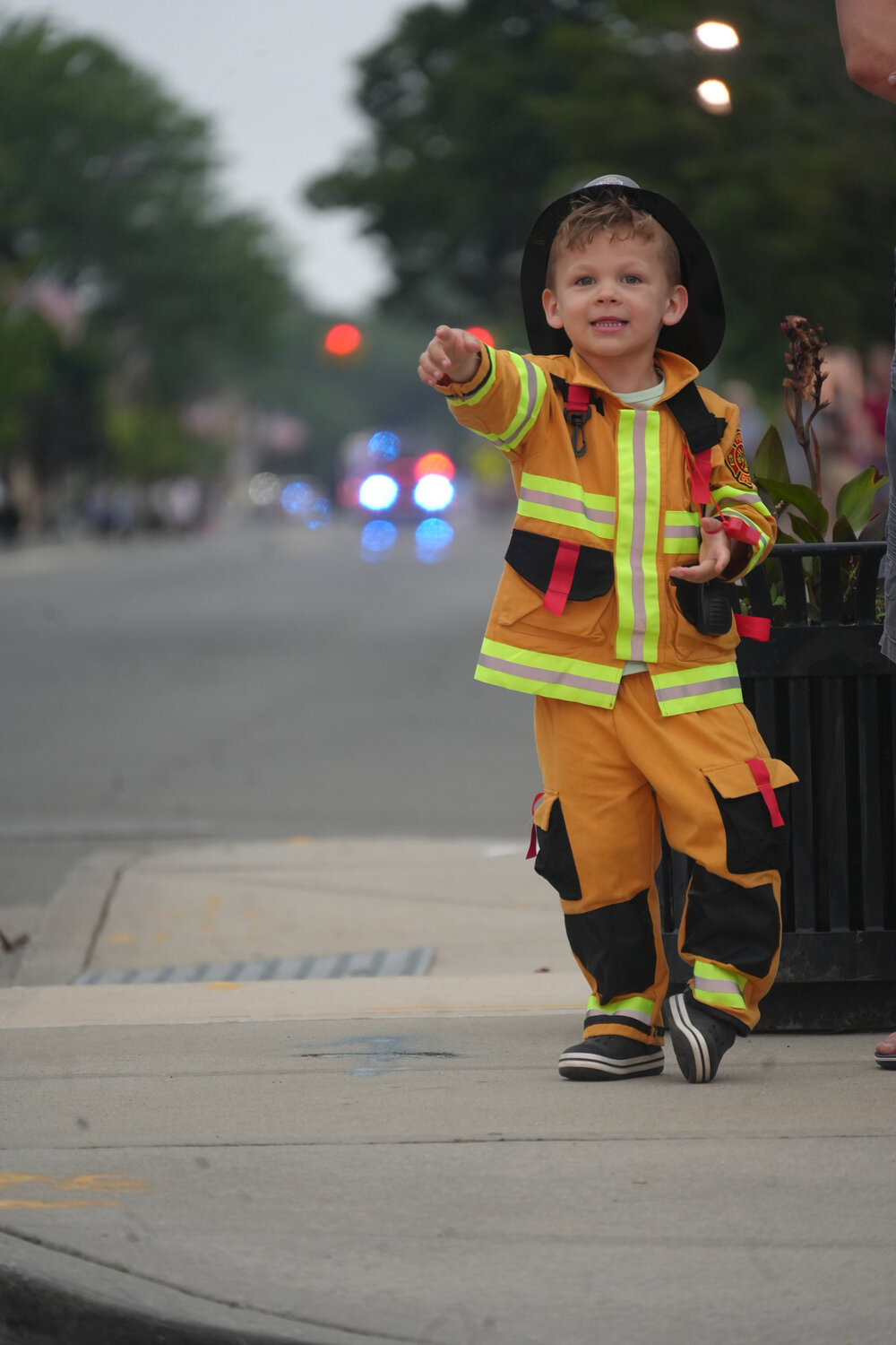 Adam Kulikauskas, 3, of Rockville Centre, was excited about the parade on Saturday night.