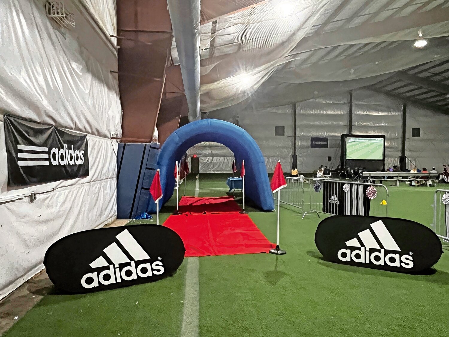 The entrance for the World Cup watch party hosted by Nassau County Executive Bruce Blakeman and the Long Island Soccer Club at Globall Sports Center allow the youngsters to run through the tunnel and feel a part of the game and celebration.