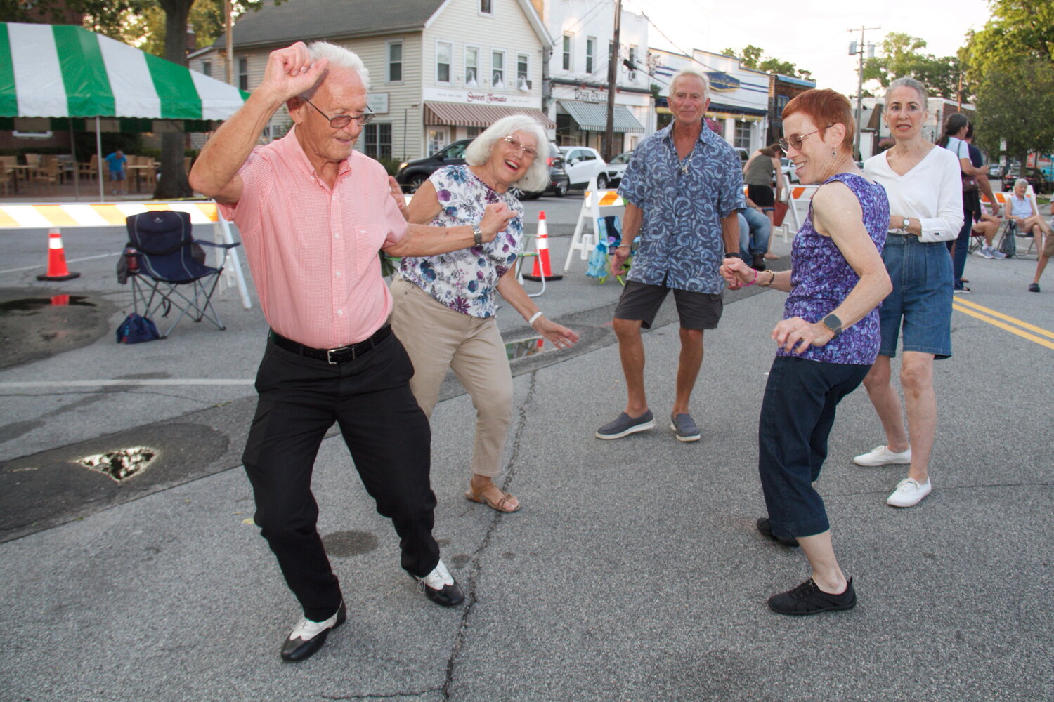 Tom Scott, left, Sophia and Fred Gordin, Sherry Bloom, and Ruth Eichacker danced the twist at Dancing in the Street.