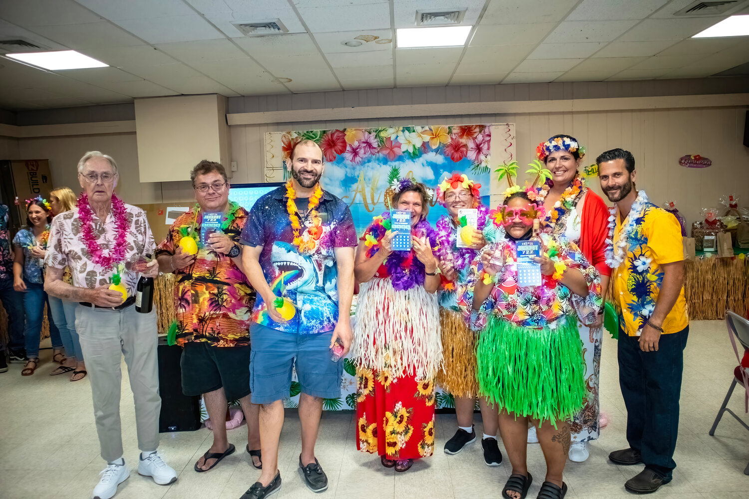 Winners of the Best Luau Costumes Joe O’Donoghue from Florida, Drew Kovarik from Kings Point, Scott Briskin from West Hempstead, Stephanie Brudecki from Elmont, Lorie Giannini from Floral Park and Tiesher Jones.