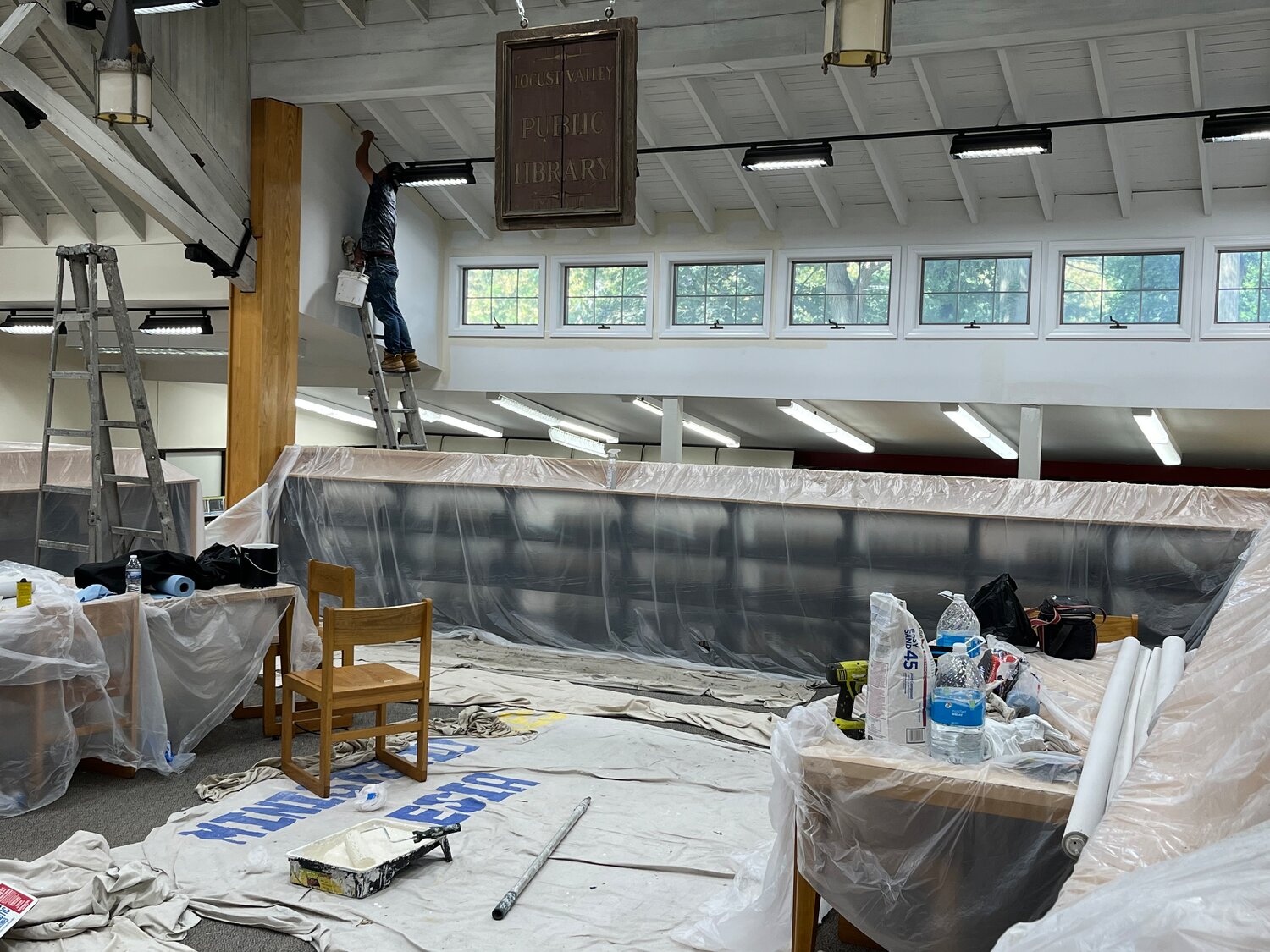 Workers have already begun repainting and recarpeting the interior of the Locust Valley Library.
