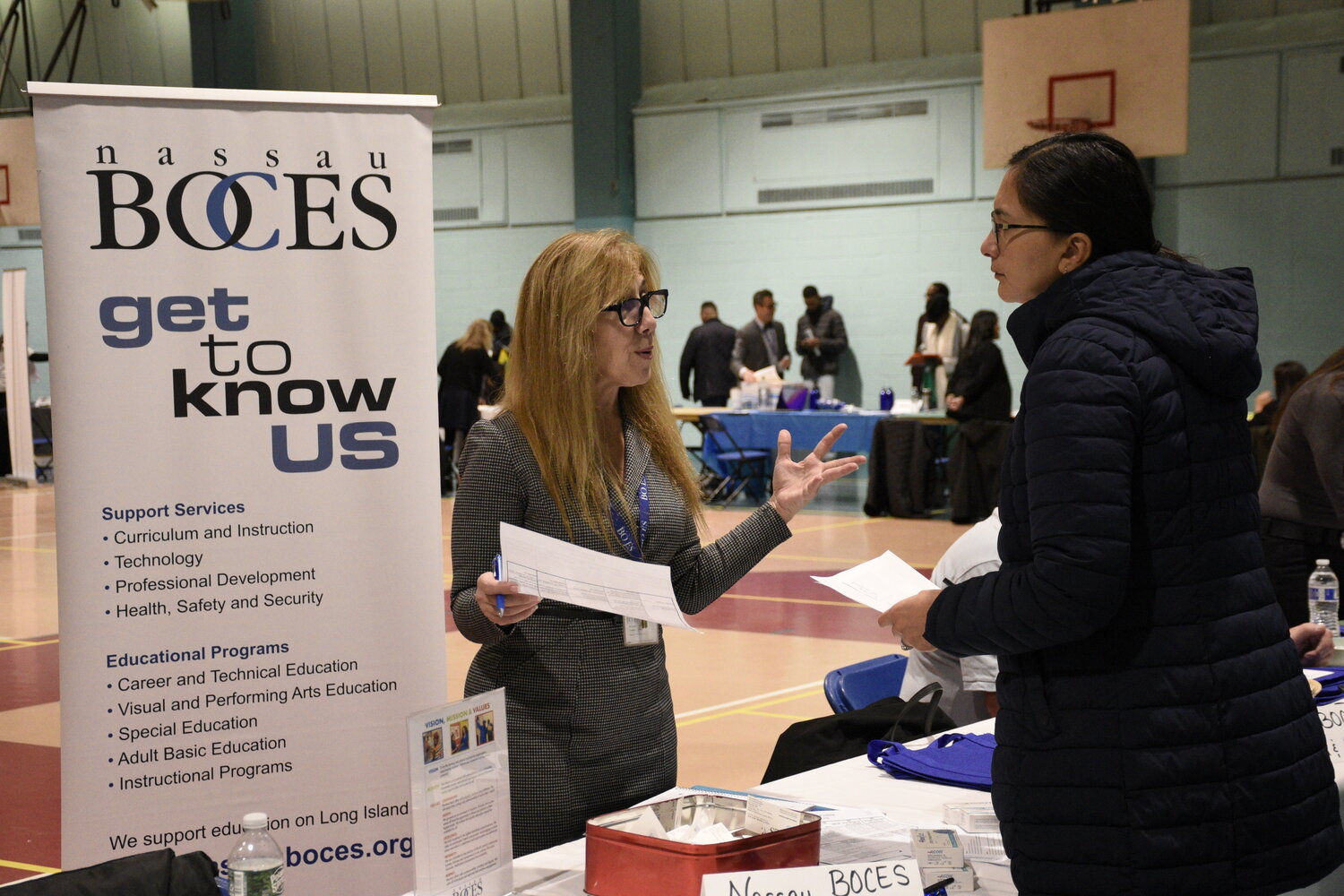 Job seekers get details about career opportunities at last year’s job fair.