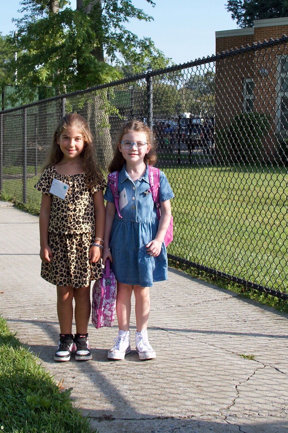 Olivia Purpi, left, and Hope Dziomba, both 7, were ready for the first day.