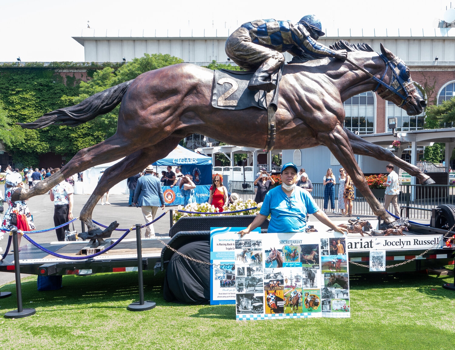 Queens resident Luis Ramos celebrated the 50th anniversary of Secretariat’s Triple Crown win at Belmont Park in front of the statue.