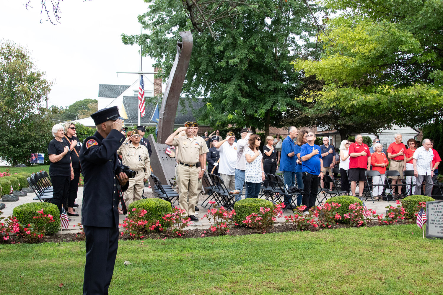 Neighbors paid their respects at the remembrance service last Sunday.