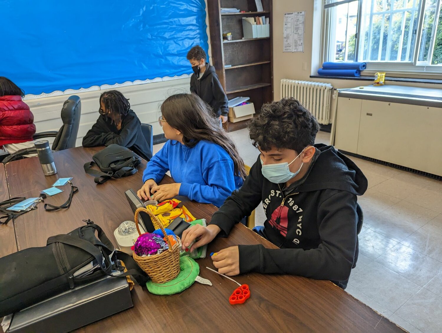 Students in the Social Emotional Learning room at Lawrence Middle School last year, working on socializing and arts and crafts.