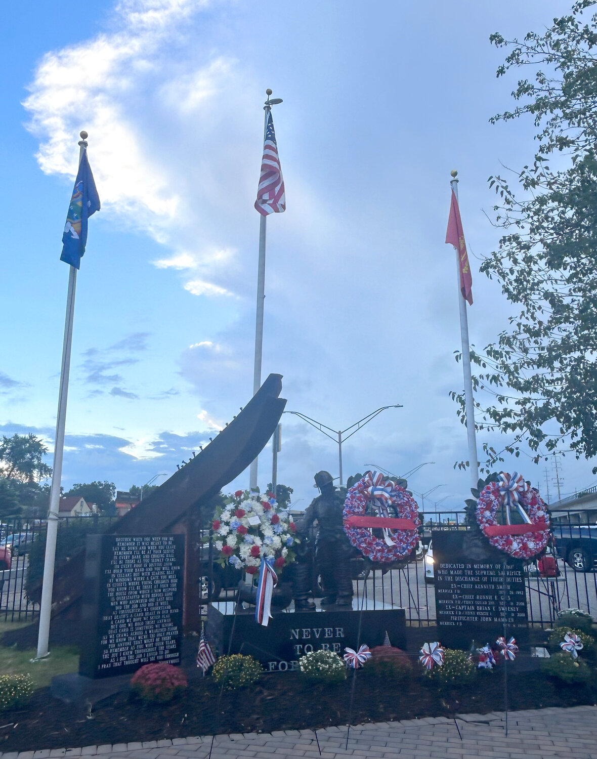 Wreathes were placed in front of the hamlet’s Sept. 11 memorial.