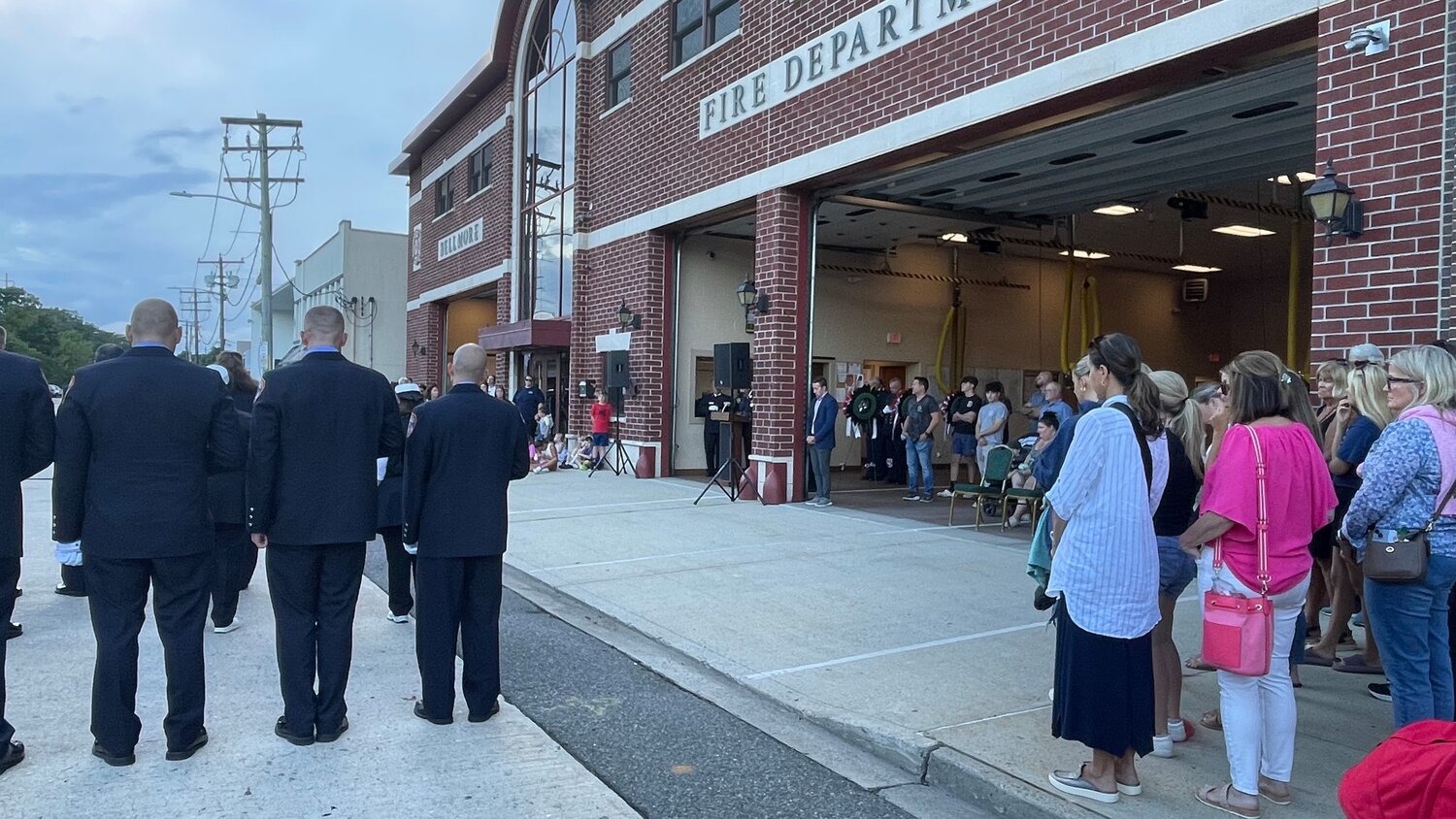 Fire department personnel and community members gathered inside and outside of Bellmore’s department, to commemorate the 22nd anniversary or Sept. 11.