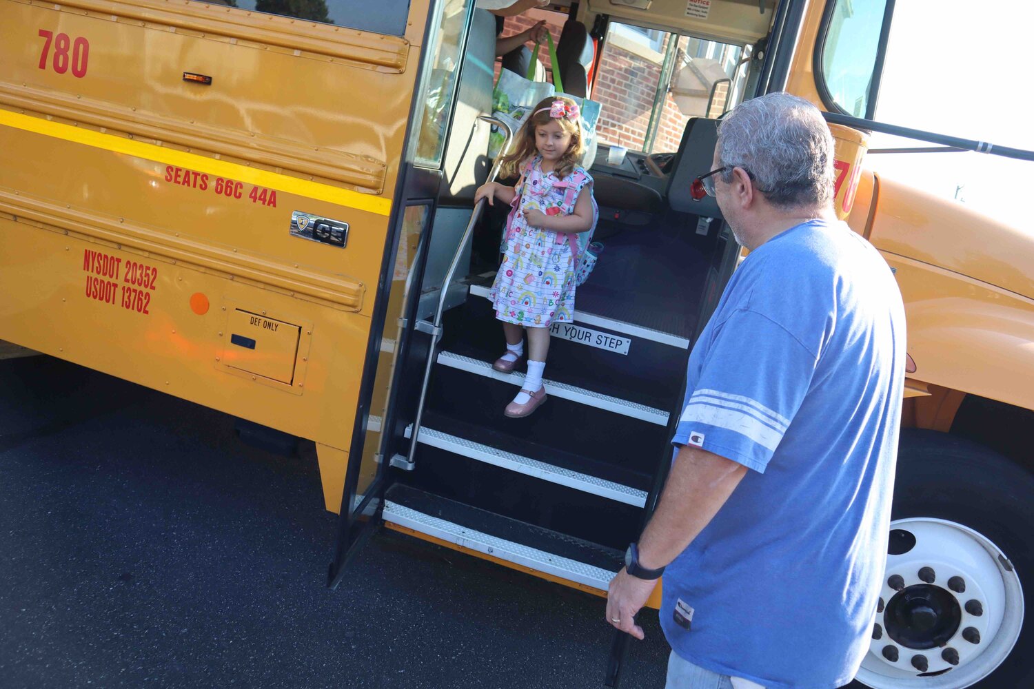 Kindergartener Zoey Florio was quick to stream off the bus and start the day.