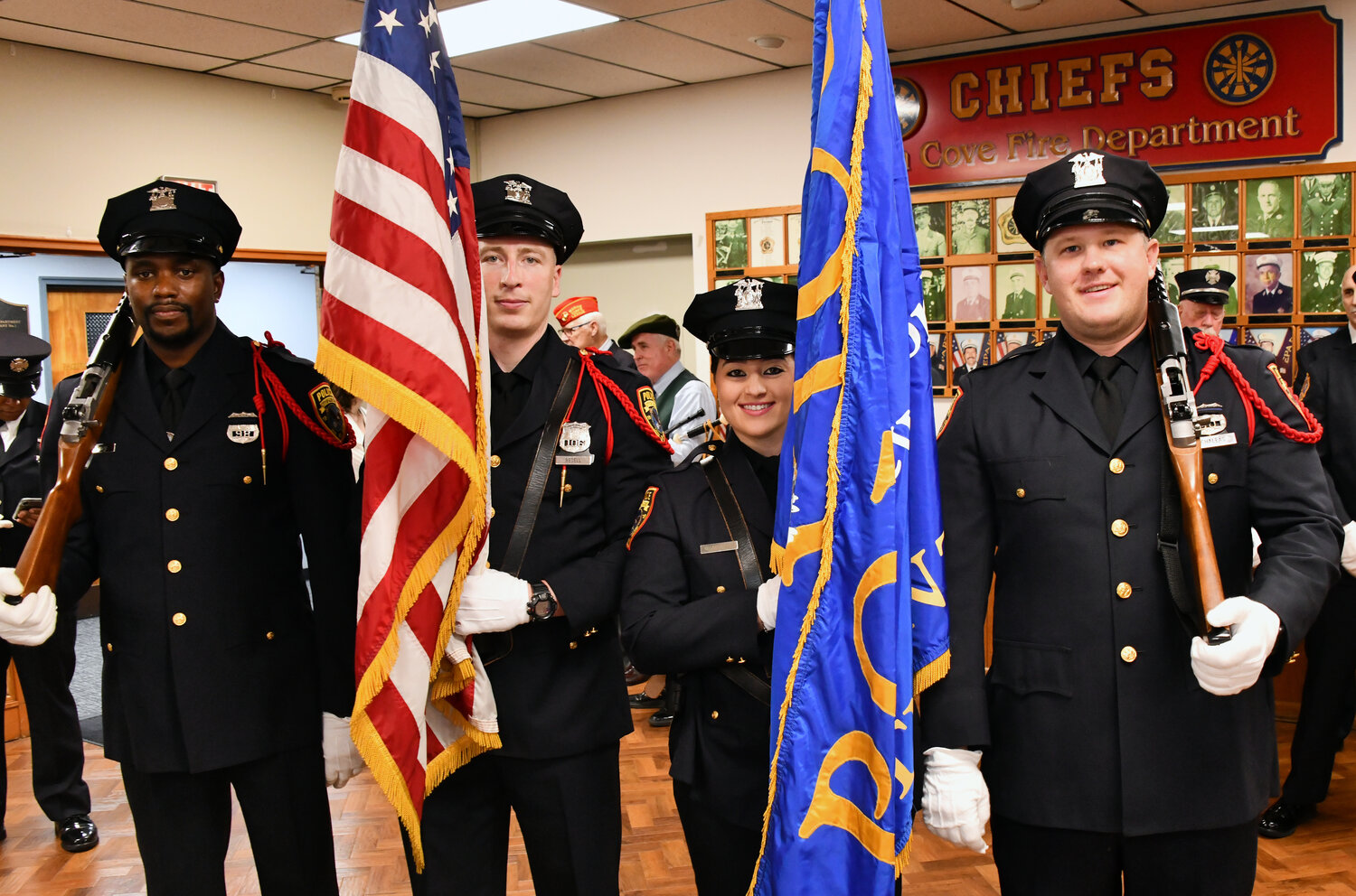 The honor guard was on hand to honor the fallen on the mournful day. Peter Michaleas, far left, Benjamin Bdell, Selena Guastella and Darren Pitttman proudly displayed their patriotism with American flags.