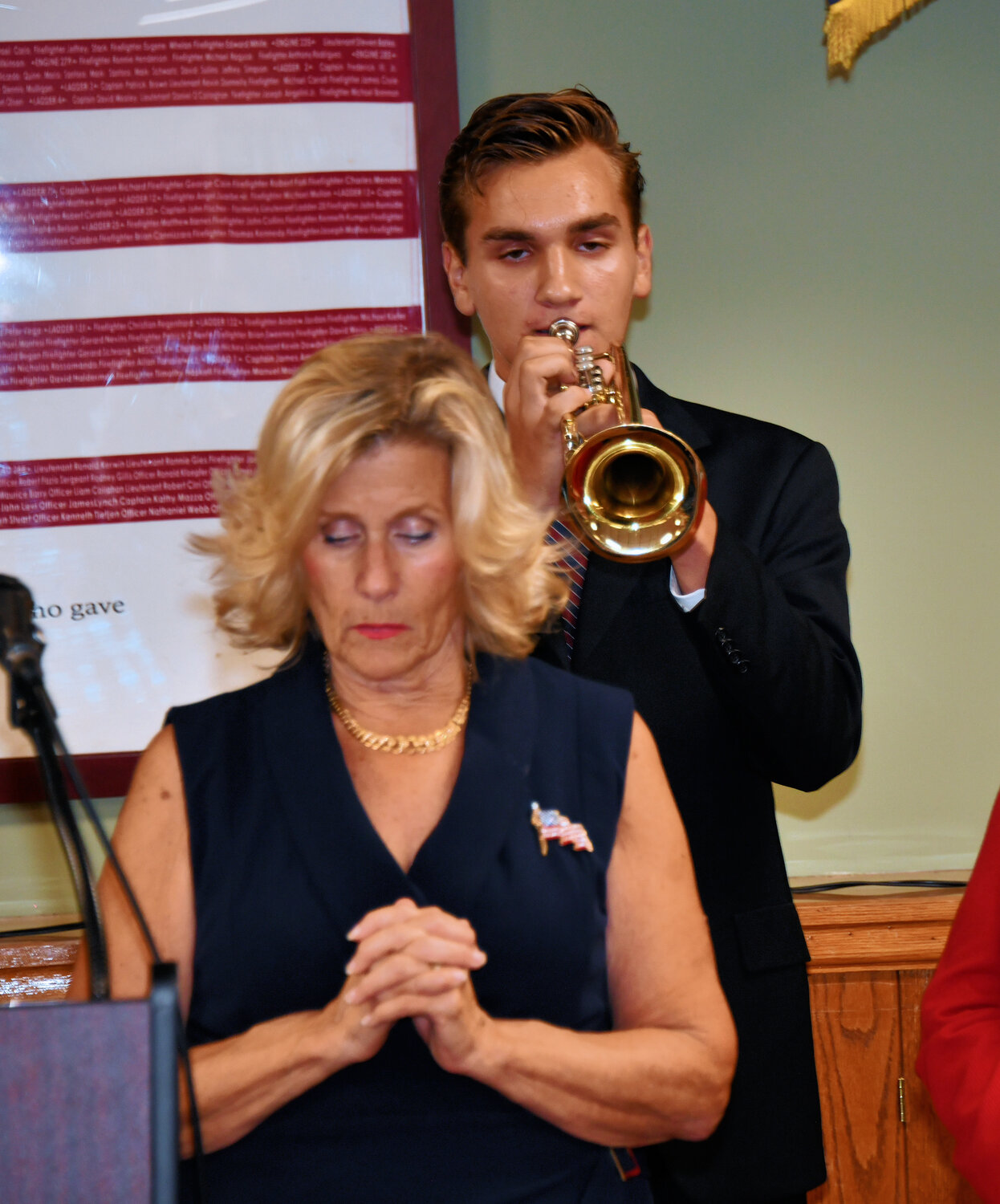 Mathew McCormack played taps, before Mayor Panzenbeck led the crowd in a moment of silence.