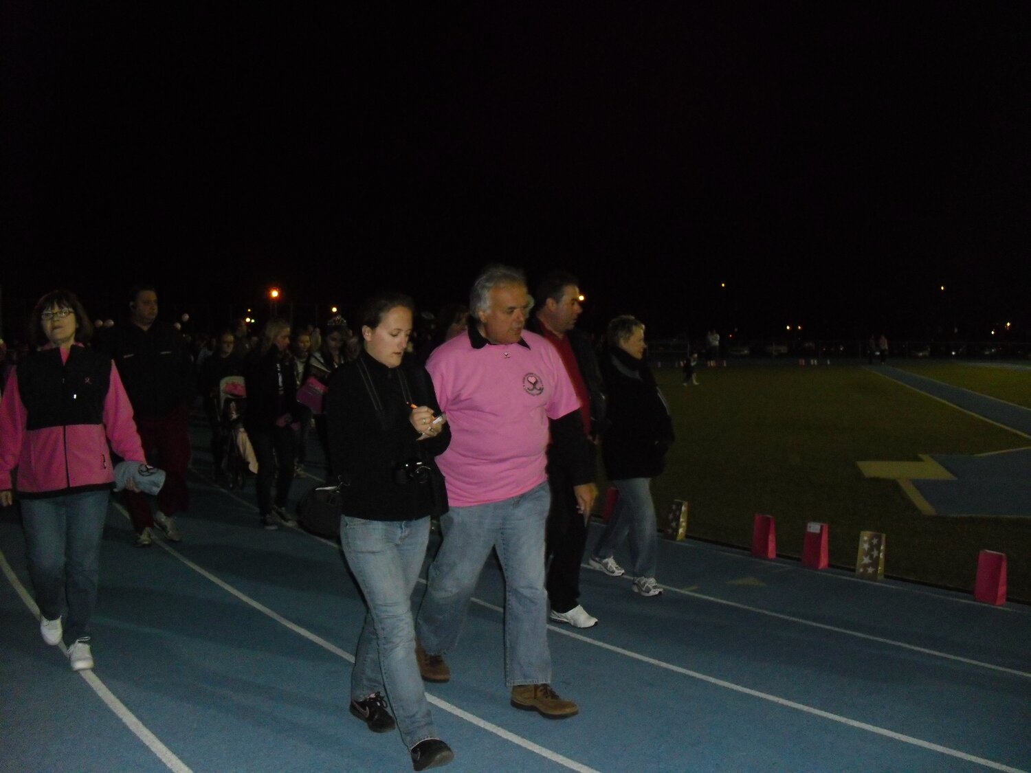 The Walk of Lights event was held at the Seaford High School in 2013. In front, Joe Satriano walked with those who had loved ones affected by cancer.