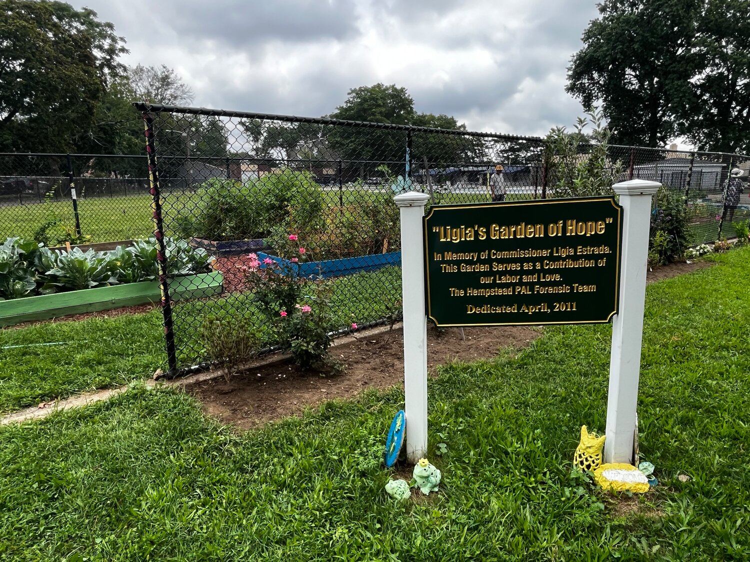 The sign welcoming all residents to Hempstead’s community garden, Ligia’s Garden of Hope, which was donated in 2011 in memory of the garden’s original commissioner, Ligia Estrada.