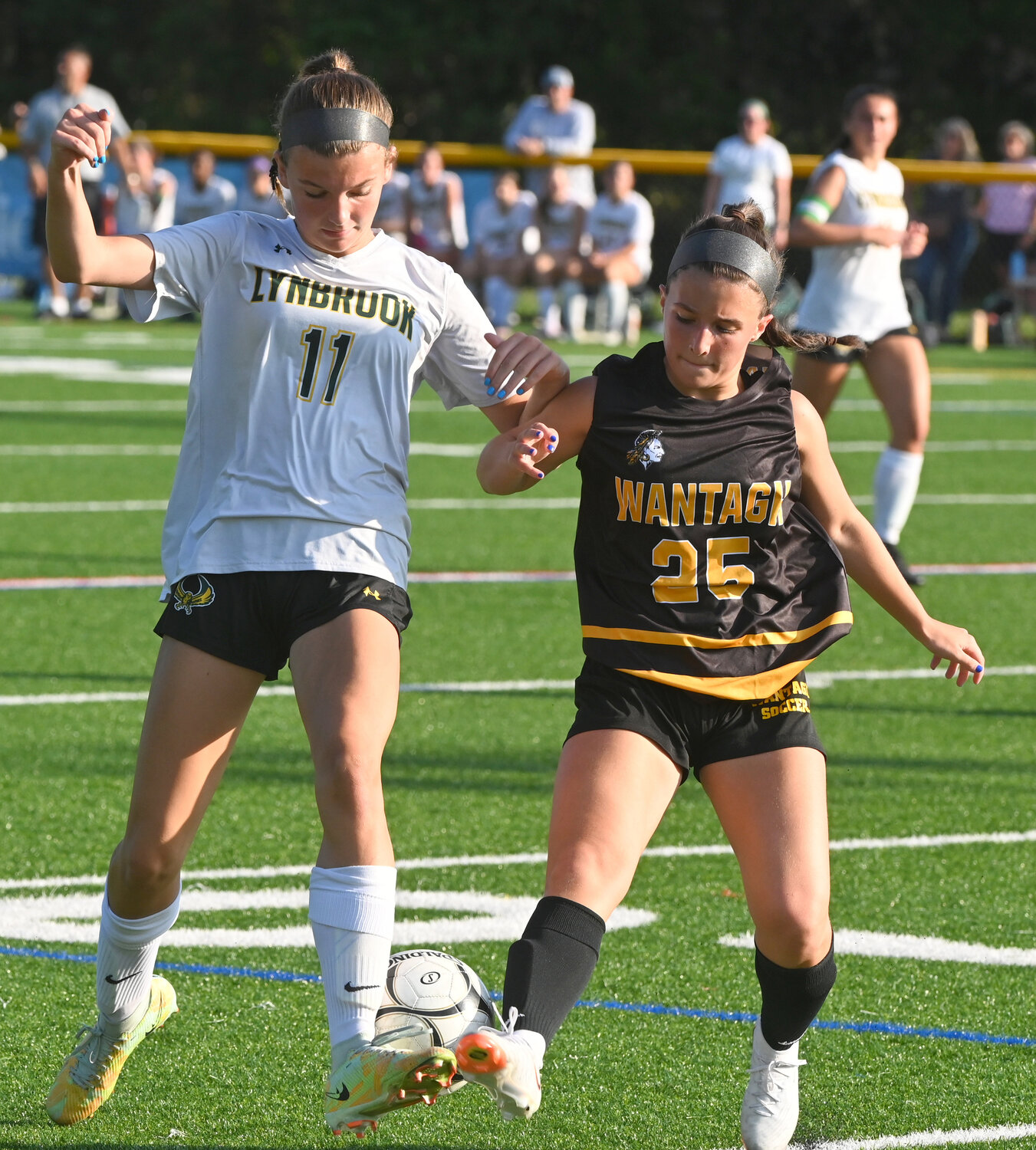 Lynbrook’s Jessie Vuotto, left, and Wantagh’s Brianna Henriques battled for possession during a Sept. 13 Conference A-1 matchup.